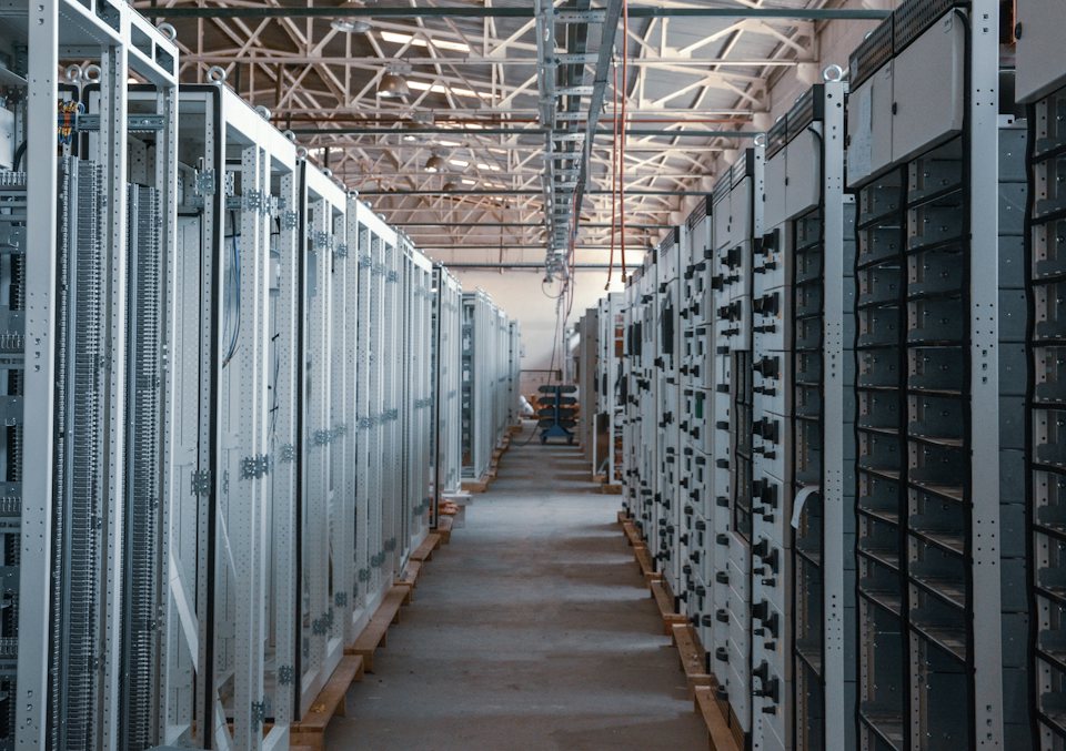 Rows of electrical switchgear in a critical facility